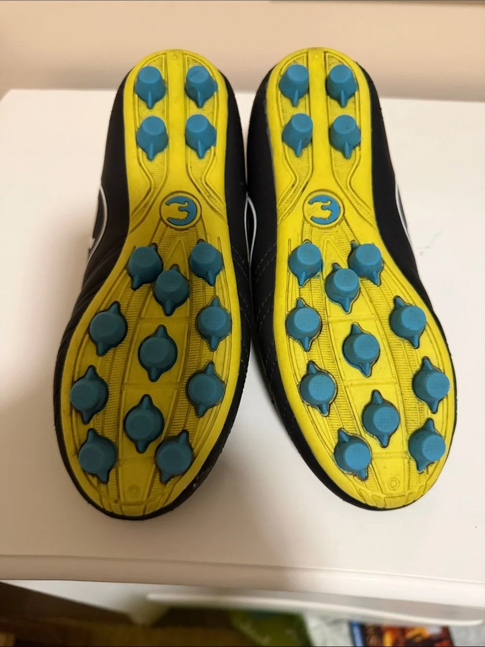 Puma Kids Black Athletic Cleats with Multicolor Speckled Laces